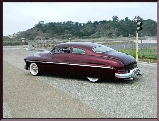 Retro car with sleek design in countryside