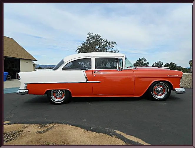 Two-tone vintage automobile side view