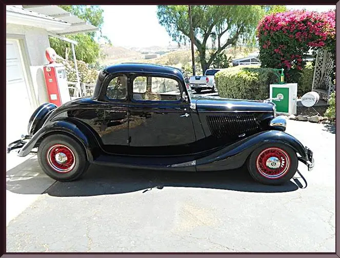 Vintage black coupe car parked outdoors