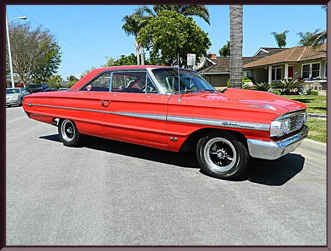 Retro red car in residential area