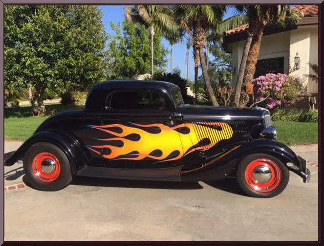 Vintage car with fiery design
