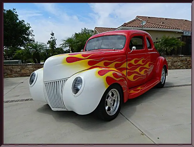 Classic car with yellow flame paint
