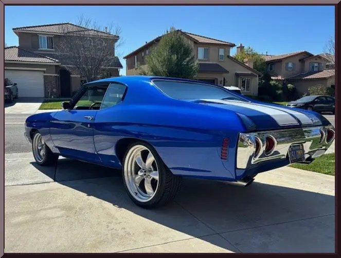Sleek retro vehicle in suburban neighborhood