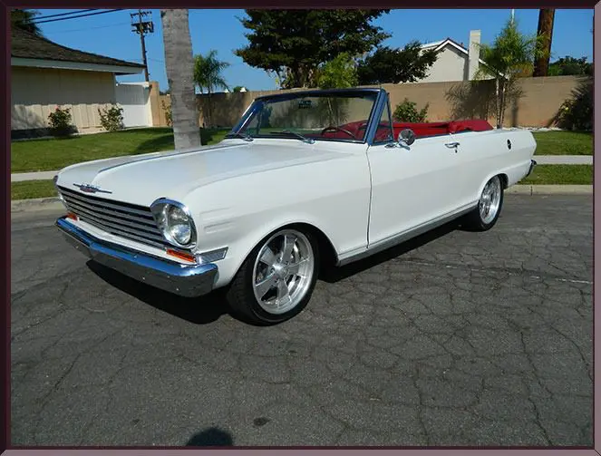 Classic white convertible car on street