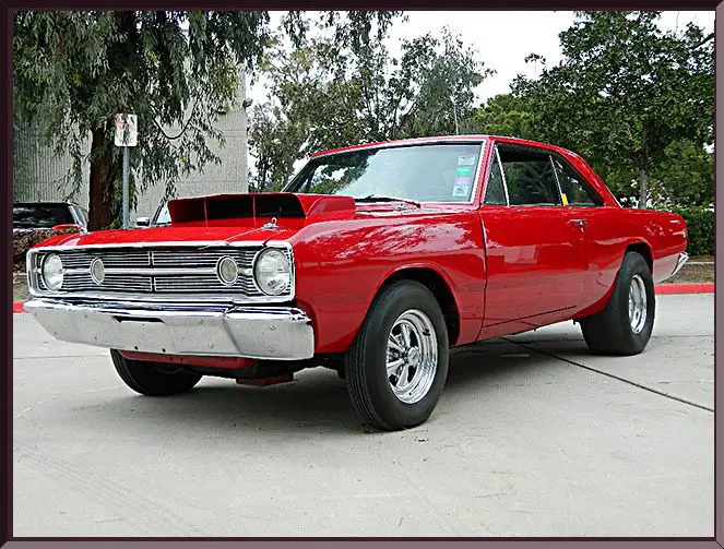 Retro red car with chrome wheels