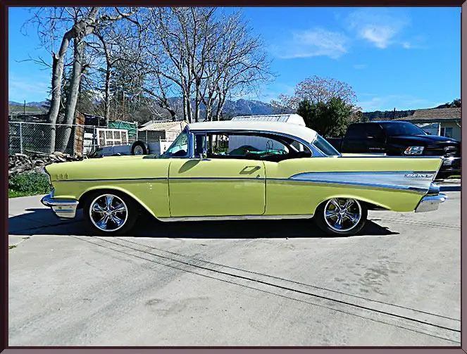 Retro vehicle in sunny driveway