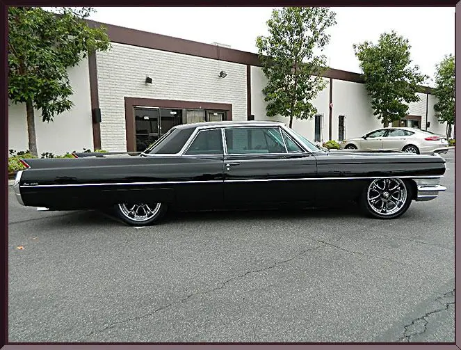 Sleek black vintage automobile exterior view
