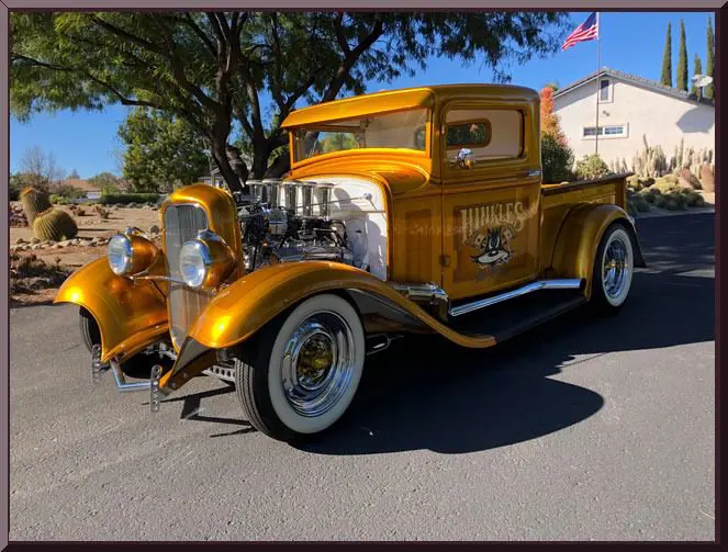 Classic hot rod parked on street