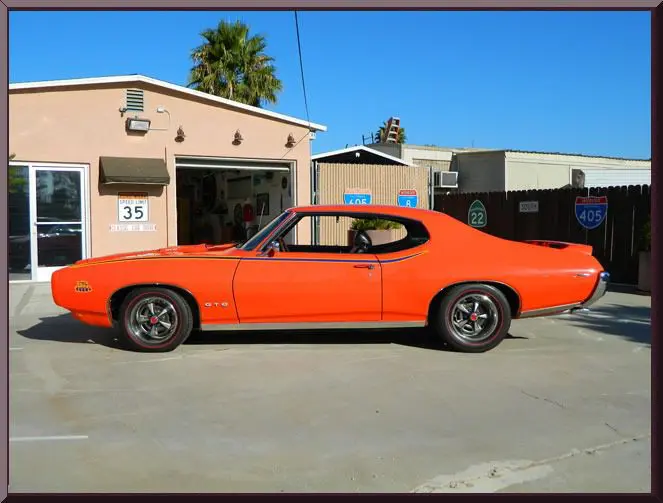 Classic muscle car in driveway