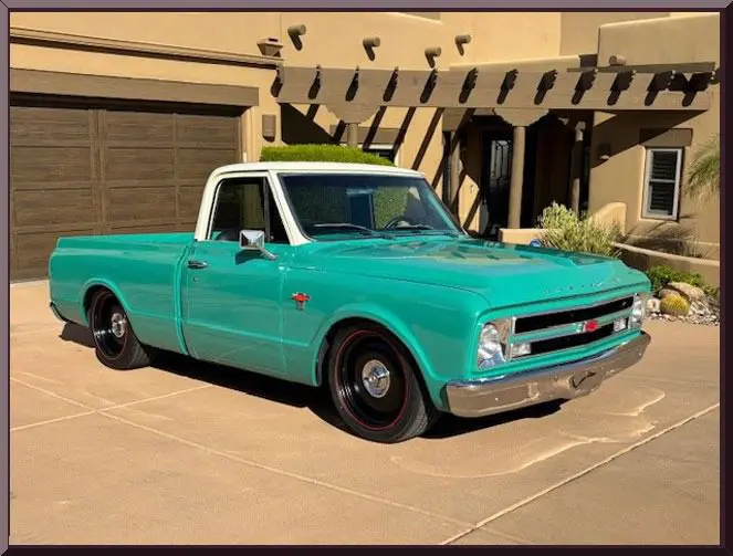 Classic teal truck with white roof