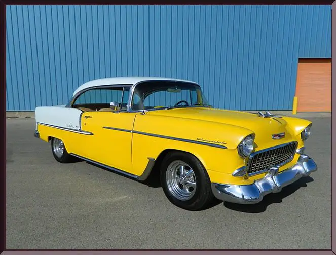 Yellow and white 1955 Chevrolet Bel Air