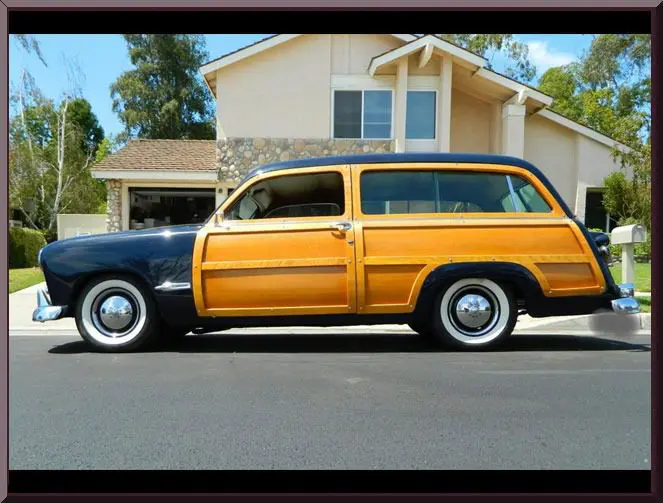 Old-fashioned vehicle in suburban neighborhood