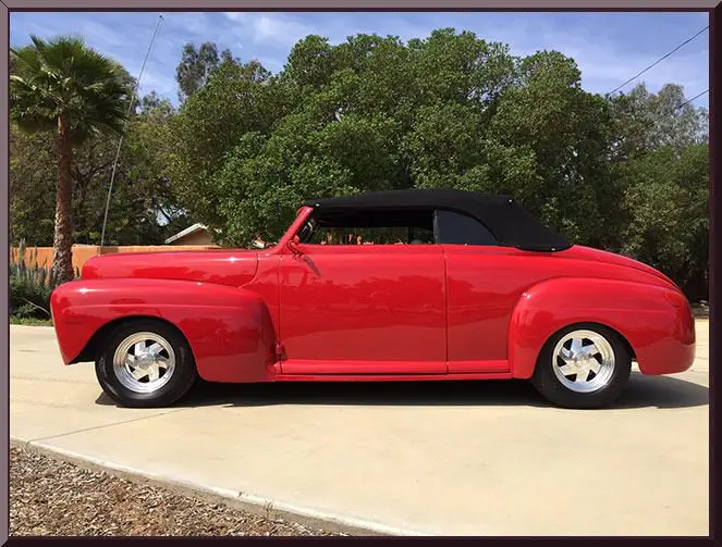 Classic red car with black roof