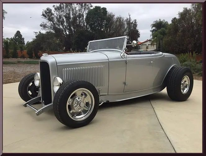 Retro roadster with shiny wheels