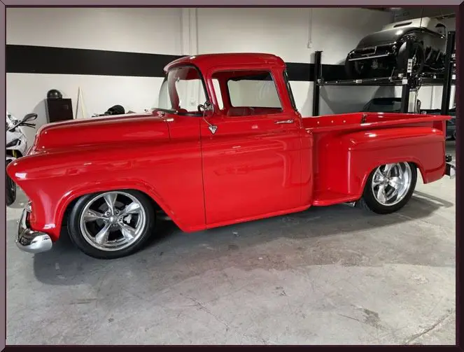 Restored vintage truck parked indoors