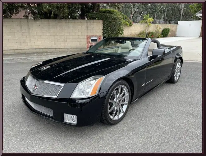 Sleek luxury car with shiny wheels