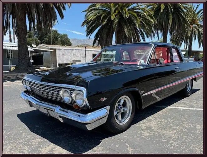 Shiny retro car with red interior
