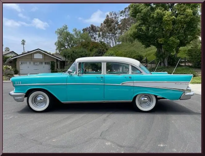 Retro automobile by suburban houses