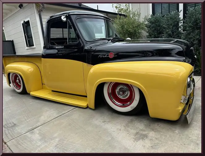 Classic truck with red hubcaps