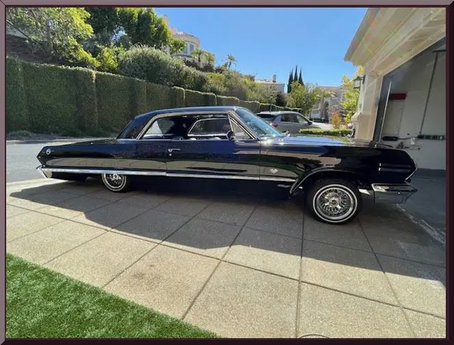 Sleek retro car outside garage