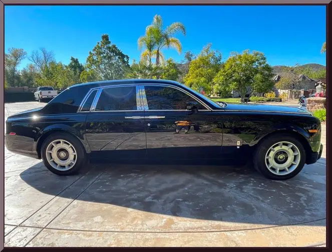 Luxury black car parked outdoors