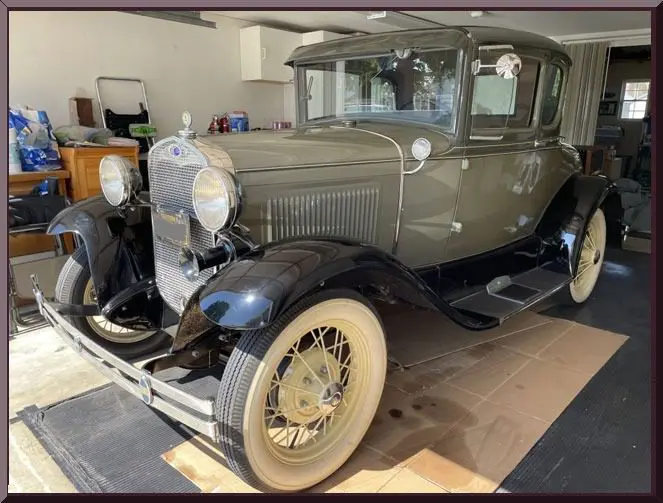 Antique vehicle with whitewall tires