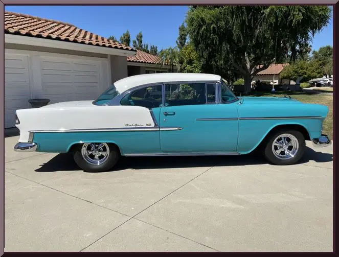 Classic turquoise and white vintage car